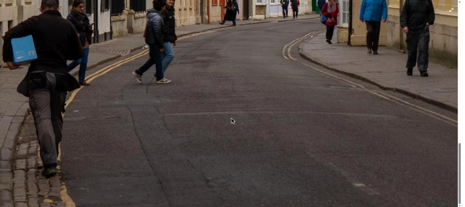 Pedestrians walking along a UK street